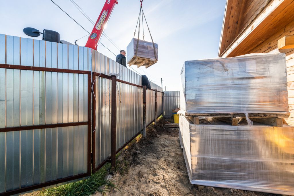 Разгрузка тротуарной плитки